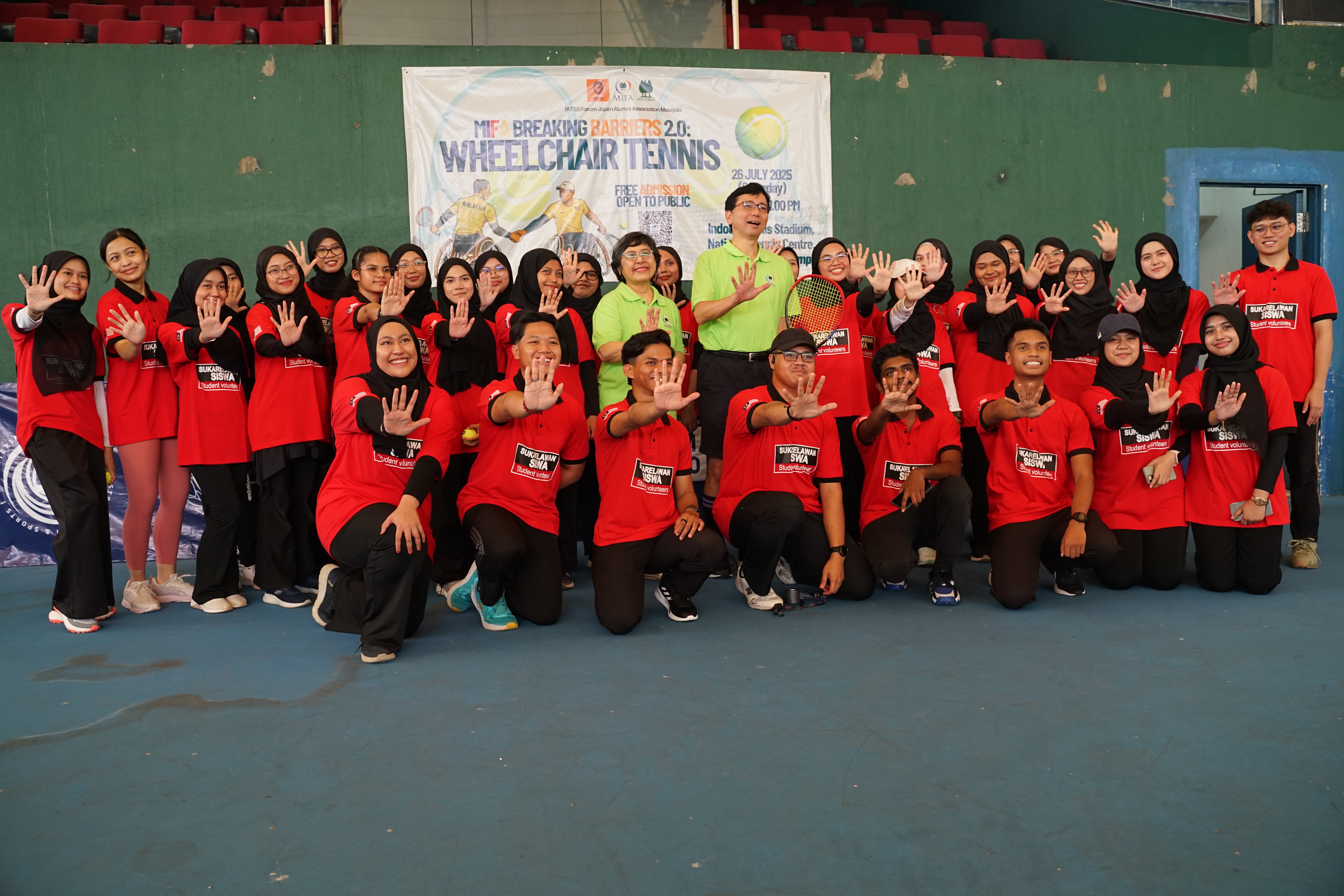 YSS volunteer team posing with MIFA and partner organisation leaders